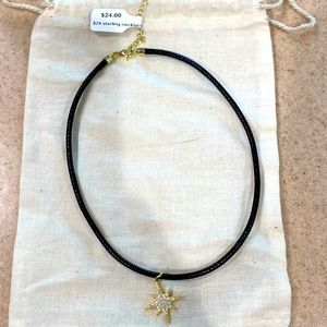 NWT Black choker necklace with gold starburst charm!